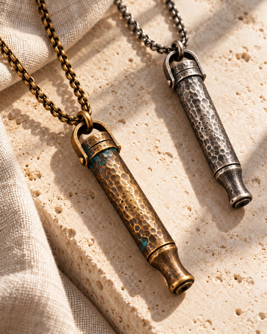 New still life of both antique finishes on travertine and linen